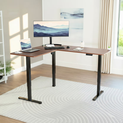 L-shaped desk with computer setup in a home office setting