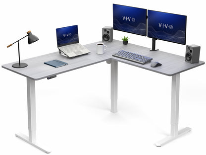 Modern L-shaped desk with computer setup including monitors, laptop, and office items on a white background.