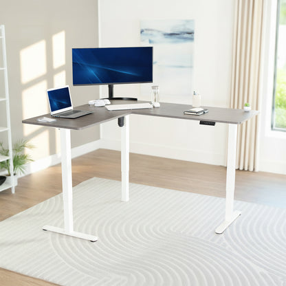 Modern L-shaped desk with computer setup in a bright room