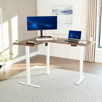 Vintage brown l-shaped desk with computer setup in a bright room