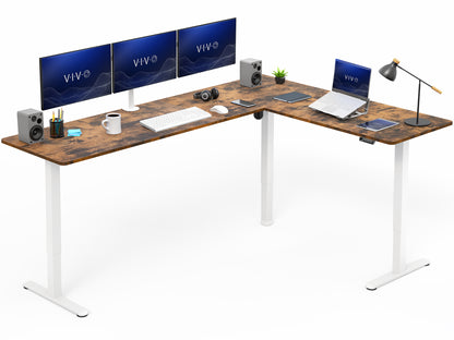Vintage brown L-shaped desk with computer setup on a white background