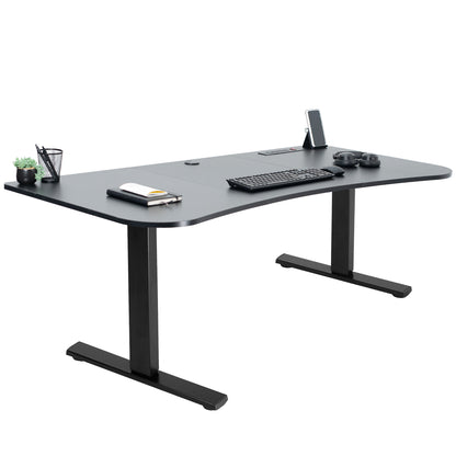 Sit to stand height adjustable electric desk with push button memory controller. Features a built-in power strip.