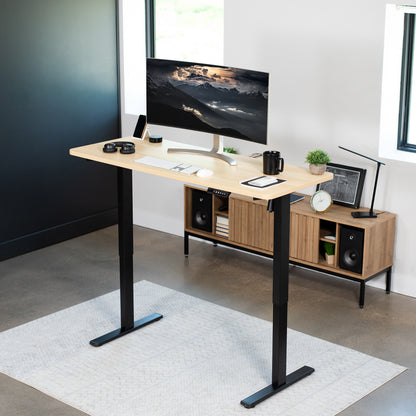 Sturdy ergonomic sit or stand active desk workstation with adjustable height using smart control panel.