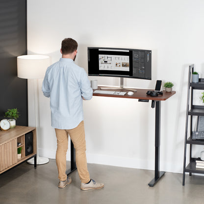 Sturdy ergonomic sit or stand active desk workstation with adjustable height using smart control panel.