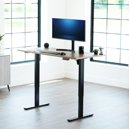 Sturdy ergonomic sit or stand active desk workstation with adjustable height using smart control panel.