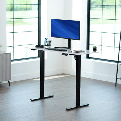 Sturdy ergonomic sit or stand active desk workstation with adjustable height using smart control panel.