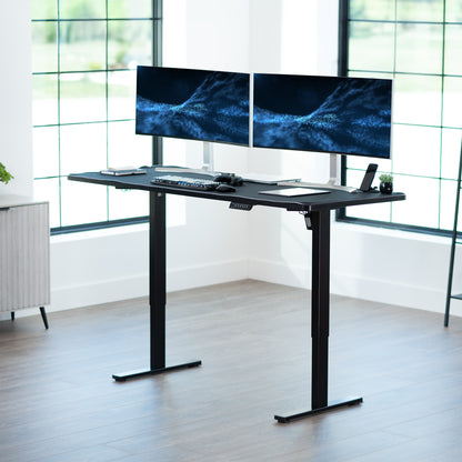 Large sturdy sit or stand modern desk with electric height adjustment options.