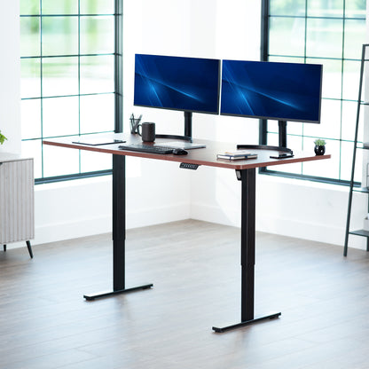 Large sturdy sit or stand modern desk with electric height adjustment options.