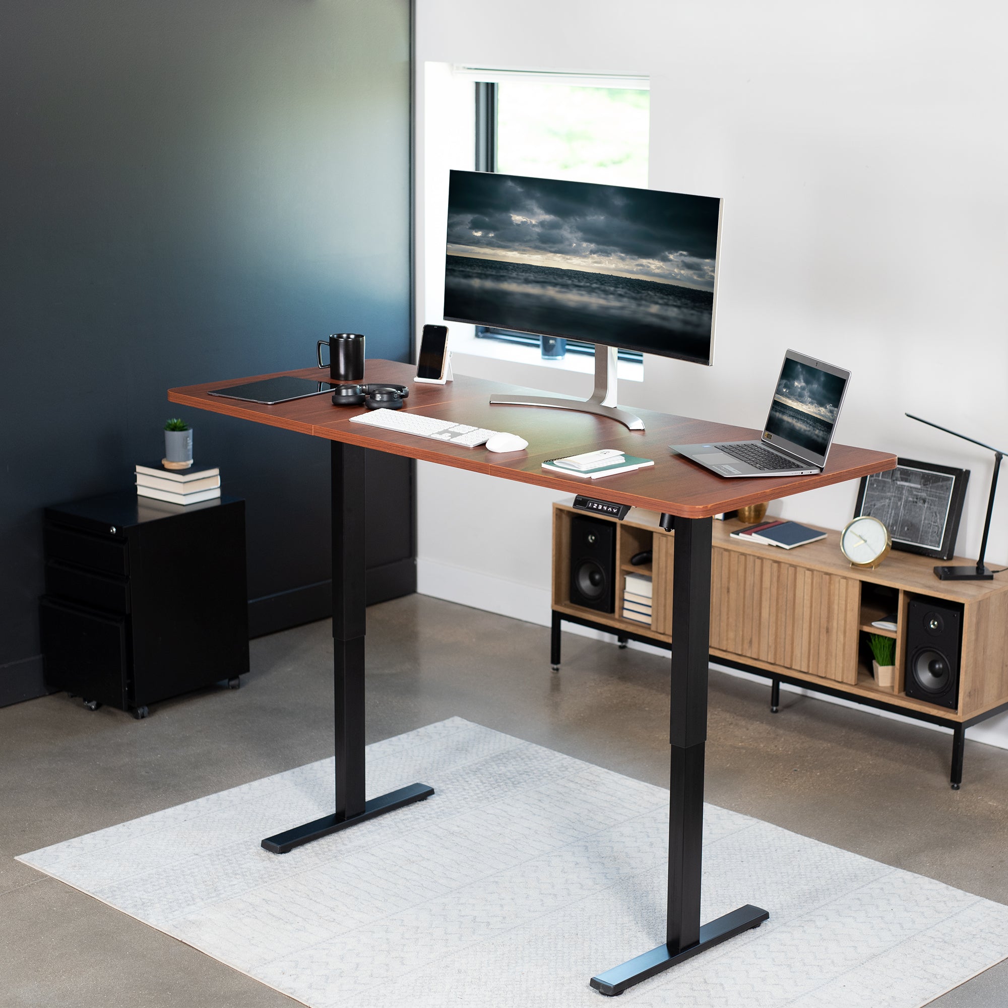 Large sturdy sit or stand active workstation with adjustable height using smart control panel.