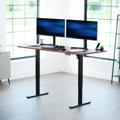 Large sturdy sit or stand modern desk with electric height adjustment options.