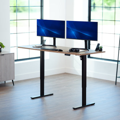 Large sturdy sit or stand modern desk with electric height adjustment options.