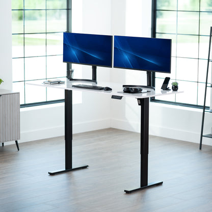 Large sturdy sit or stand modern desk with electric height adjustment options.