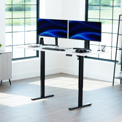 Large sturdy sit or stand modern desk with electric height adjustment options.