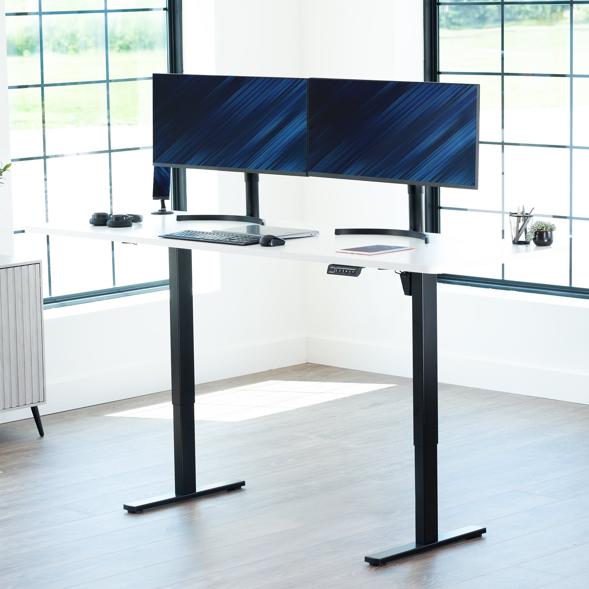 Extra large sturdy sit or stand active workstation with adjustable height using smart control panel.