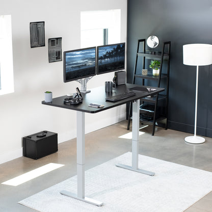 Sturdy ergonomic sit or stand active desk workstation with adjustable height using smart control panel.