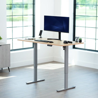 Sturdy ergonomic sit or stand active desk workstation with adjustable height using smart control panel.