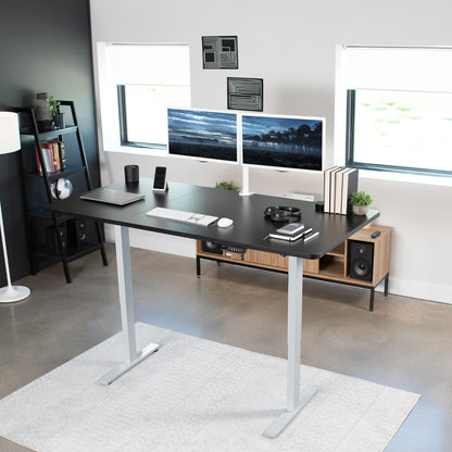 Large sturdy sit or stand active workstation with adjustable height using smart control panel.