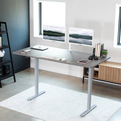 Large sturdy sit or stand active workstation with adjustable height using smart control panel.