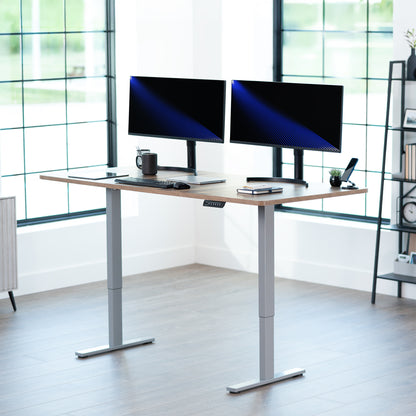 Large sturdy sit or stand modern desk with electric height adjustment options.
