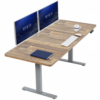Large sturdy sit or stand modern desk with electric height adjustment options.