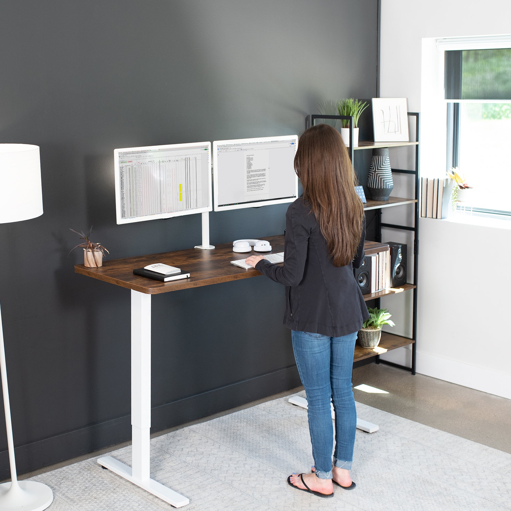 Rustic, sturdy ergonomic sit or stand active desk workstation with adjustable height using smart control panel.