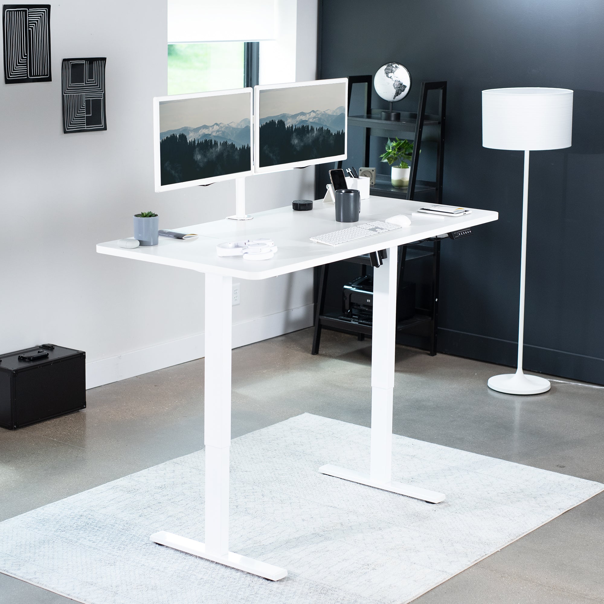 Sturdy ergonomic sit or stand active desk workstation with adjustable height using smart control panel.