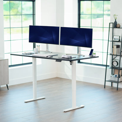 Large sturdy sit or stand modern desk with electric height adjustment options.
