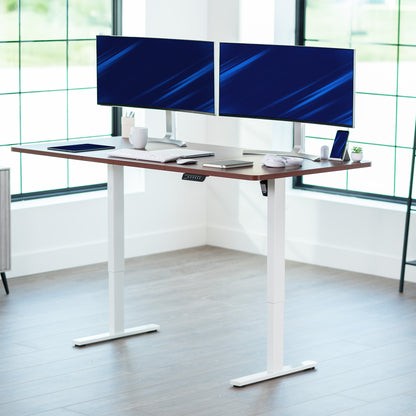 Large sturdy sit or stand modern desk with electric height adjustment options.