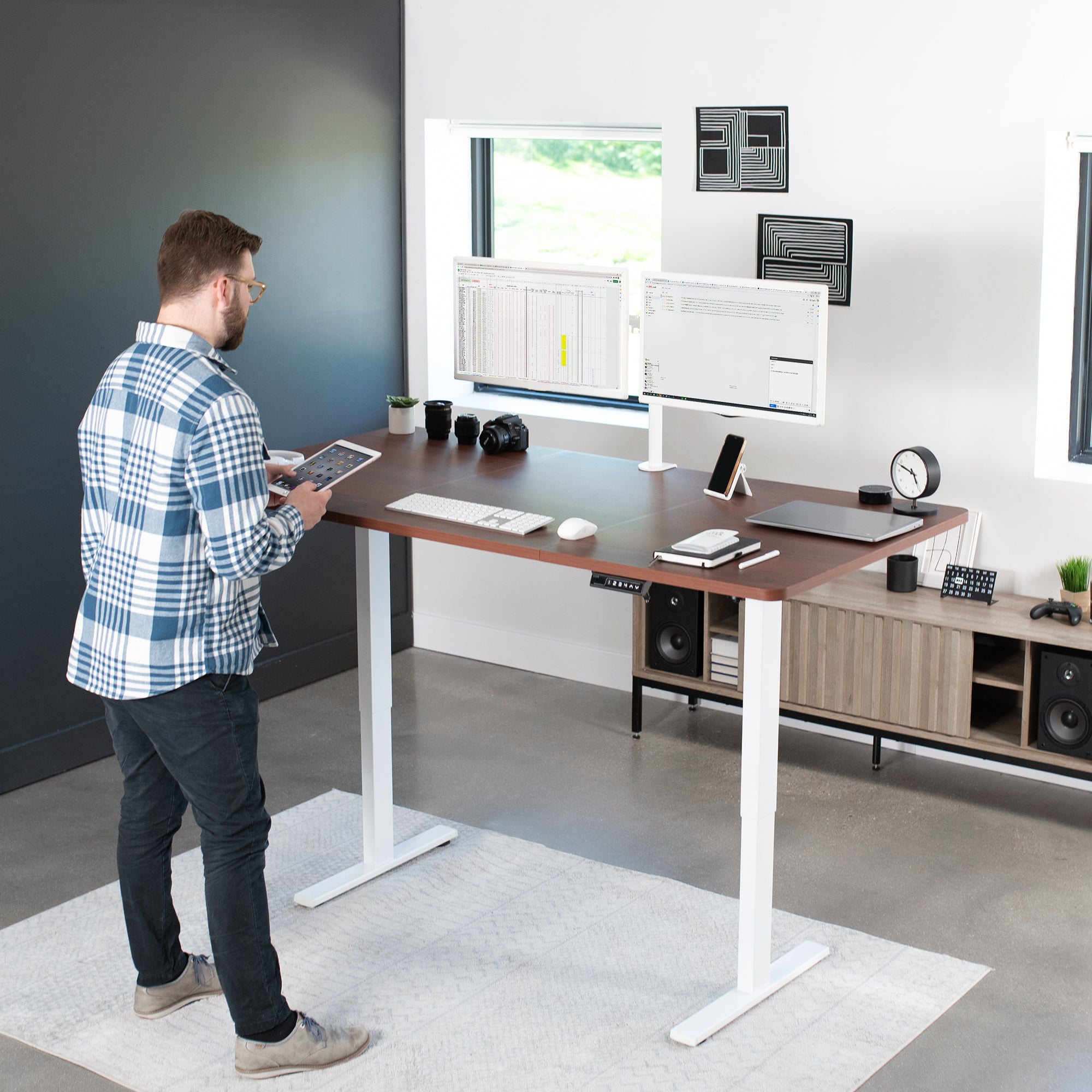 Large sturdy sit or stand active workstation with adjustable height using smart control panel.