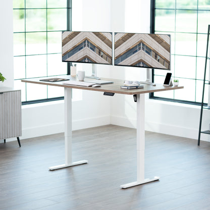 Large sturdy sit or stand modern desk with electric height adjustment options.