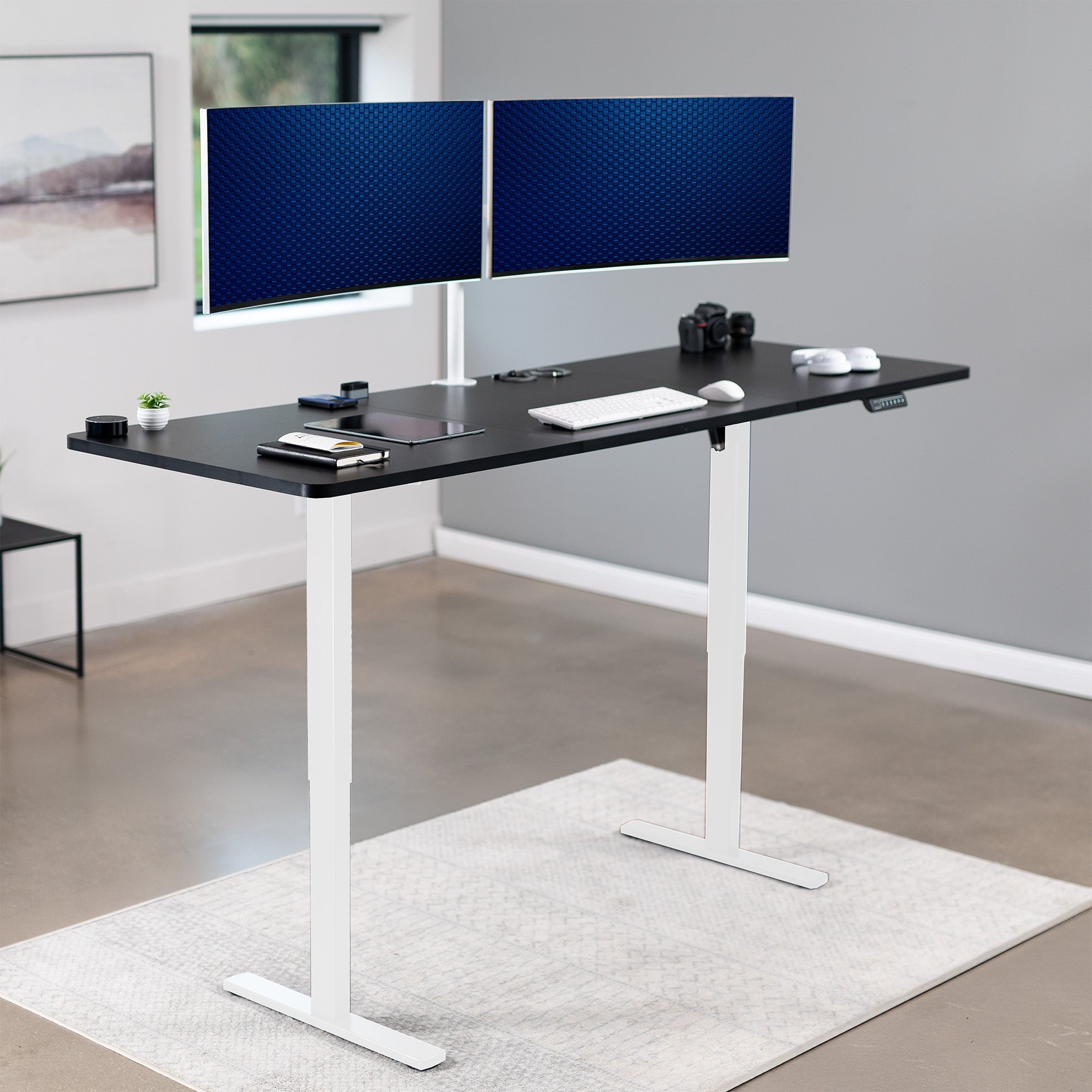 Extra large sturdy sit or stand active workstation with adjustable height using smart control panel.