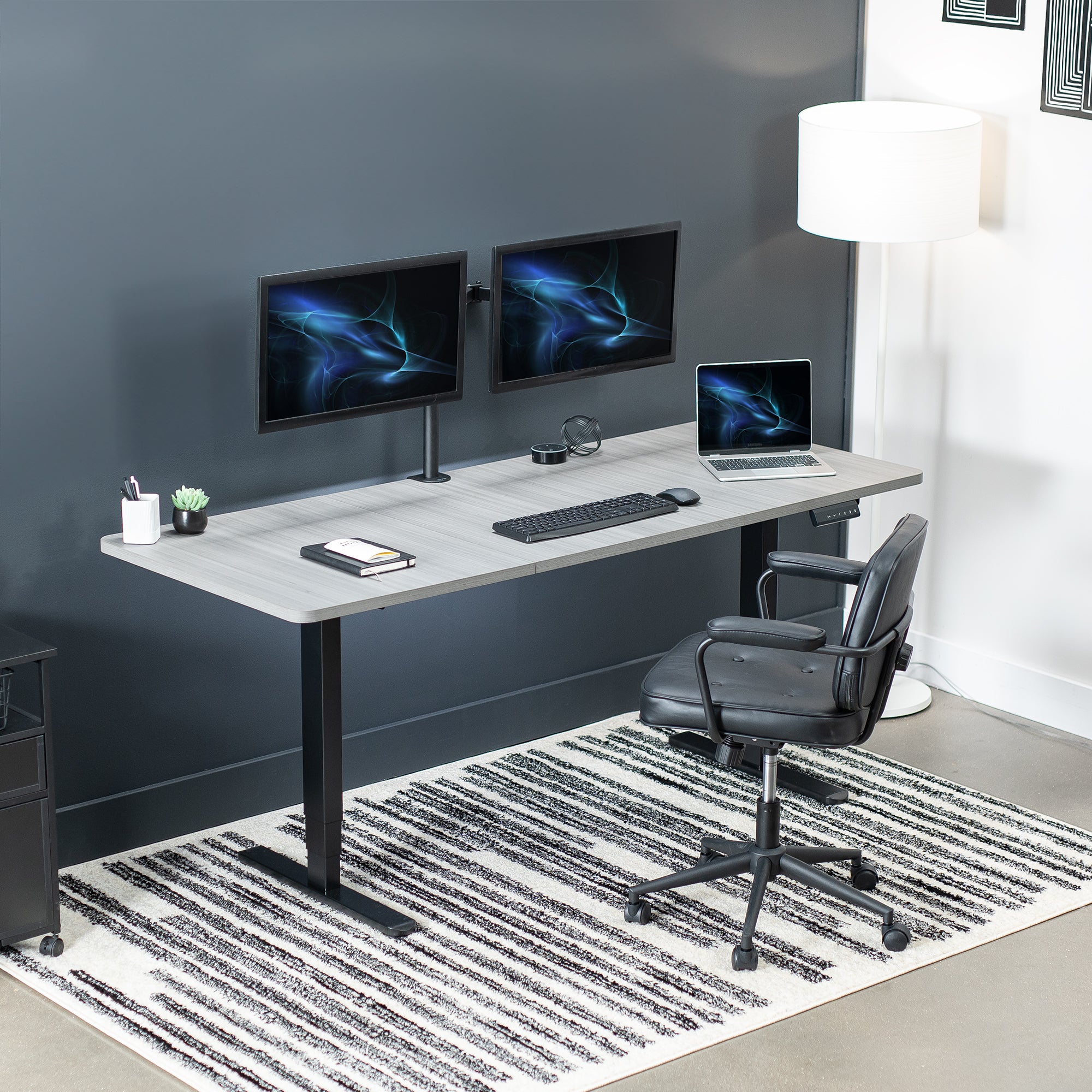 Large sturdy sit or stand active workstation with adjustable height using a memory control panel.