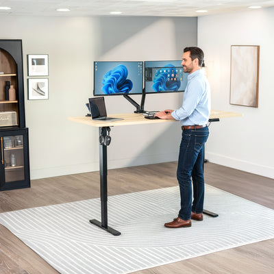 Man Standing at Bamboo Desktop 2E Series - 71" x 30" Electric Desk with Touch Screen Memory Controller