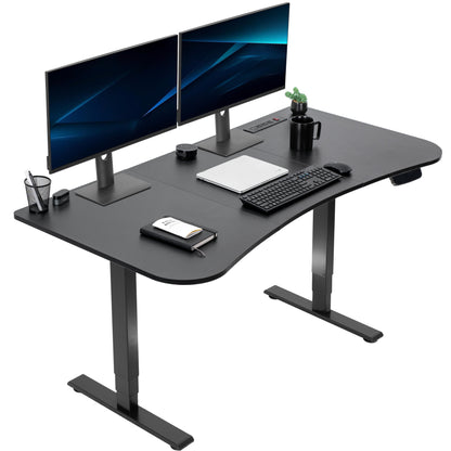 63” x 32” Electric Height Adjustable Stand Up Desk. Features a built-in power strip.