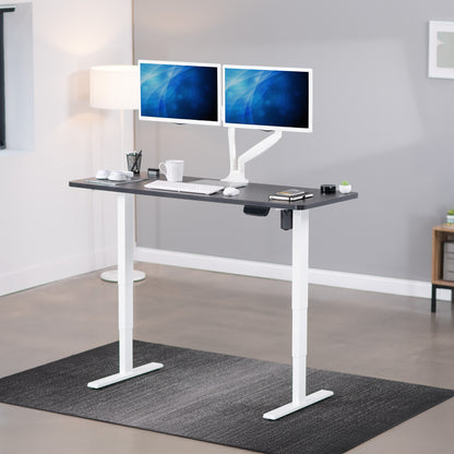 Heavy-duty electric height adjustable desktop workstation for active sit or stand efficient workspace.