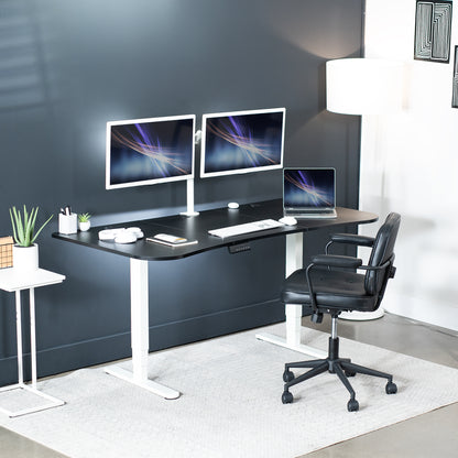 Large standing desk featuring smooth height adjustment, powerful dual motors, and a simple push-button controller featuring memory presets.