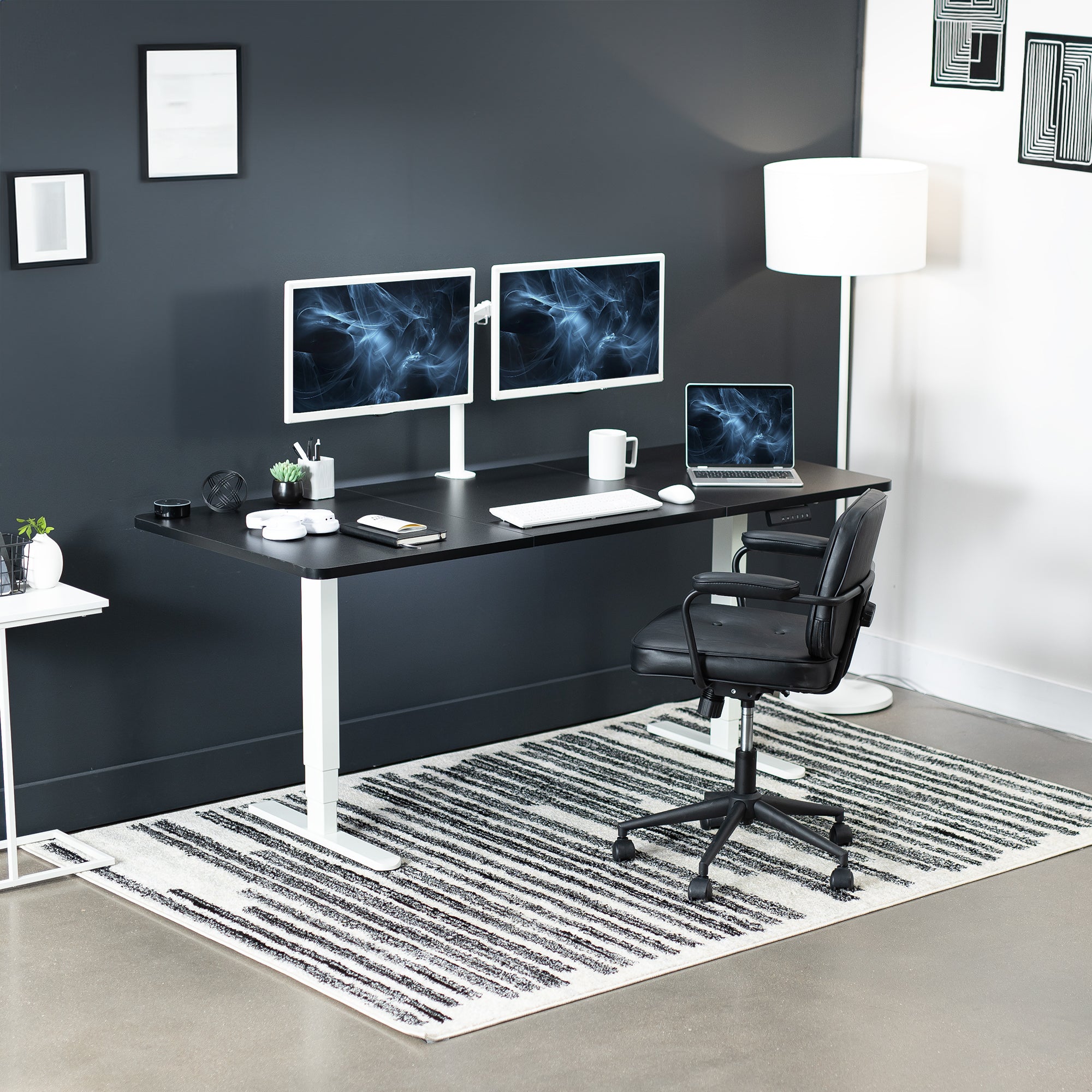 Large sturdy sit or stand active workstation with adjustable height using a memory control panel.