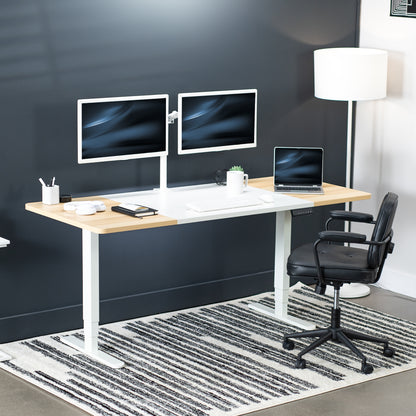 Large sturdy sit or stand workstation with adjustable height using a memory control panel.