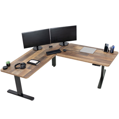 Heavy-duty electric height adjustable corner desk workstation for active sit or stand efficient workspace.