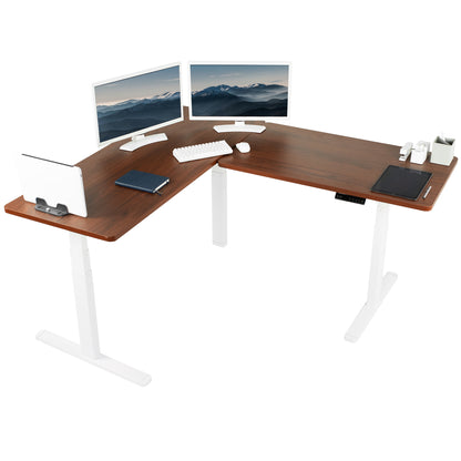 Heavy-duty electric height adjustable corner desk workstation for active sit or stand efficient workspace.