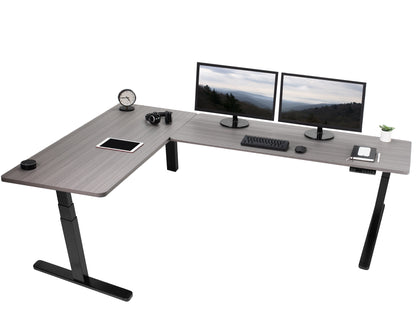 Large sturdy height adjustable corner desk workstation with memory controller.