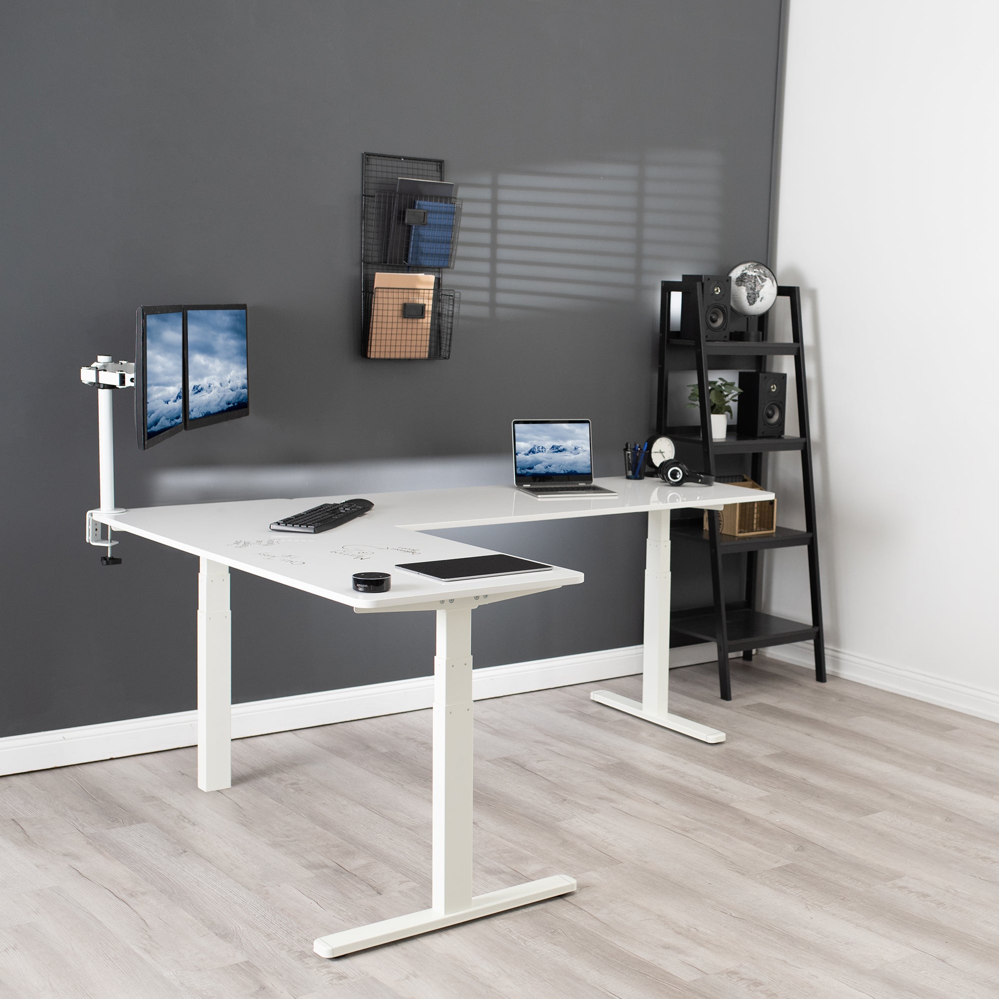 Large sturdy height adjustable corner desk workstation with memory controller.