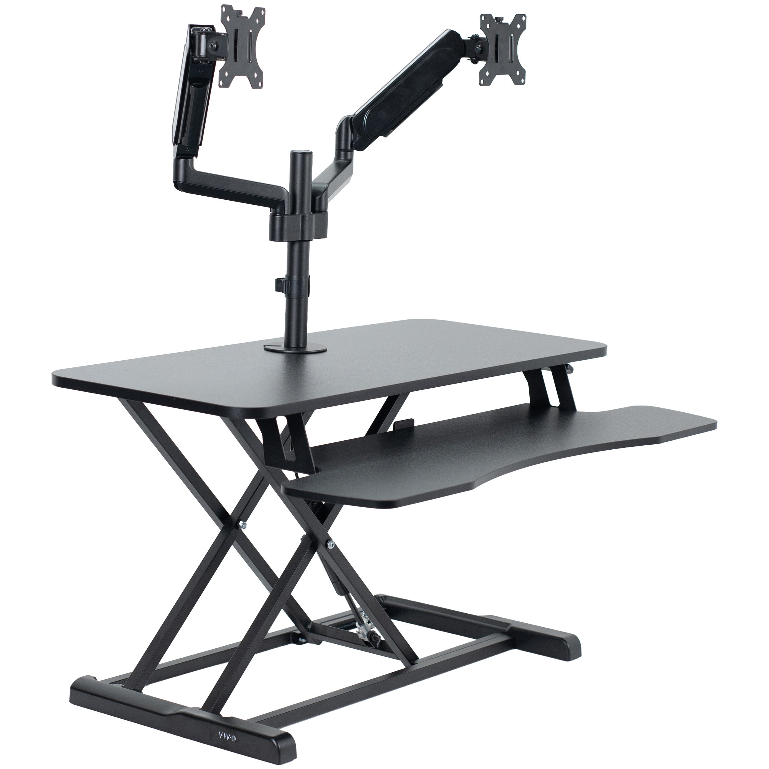 36 inch height adjustable desk riser with articulating pneumatic dual monitor mount.