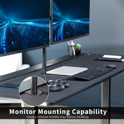 Desk setup with dual monitors, keyboard, and mouse on a dark surface.