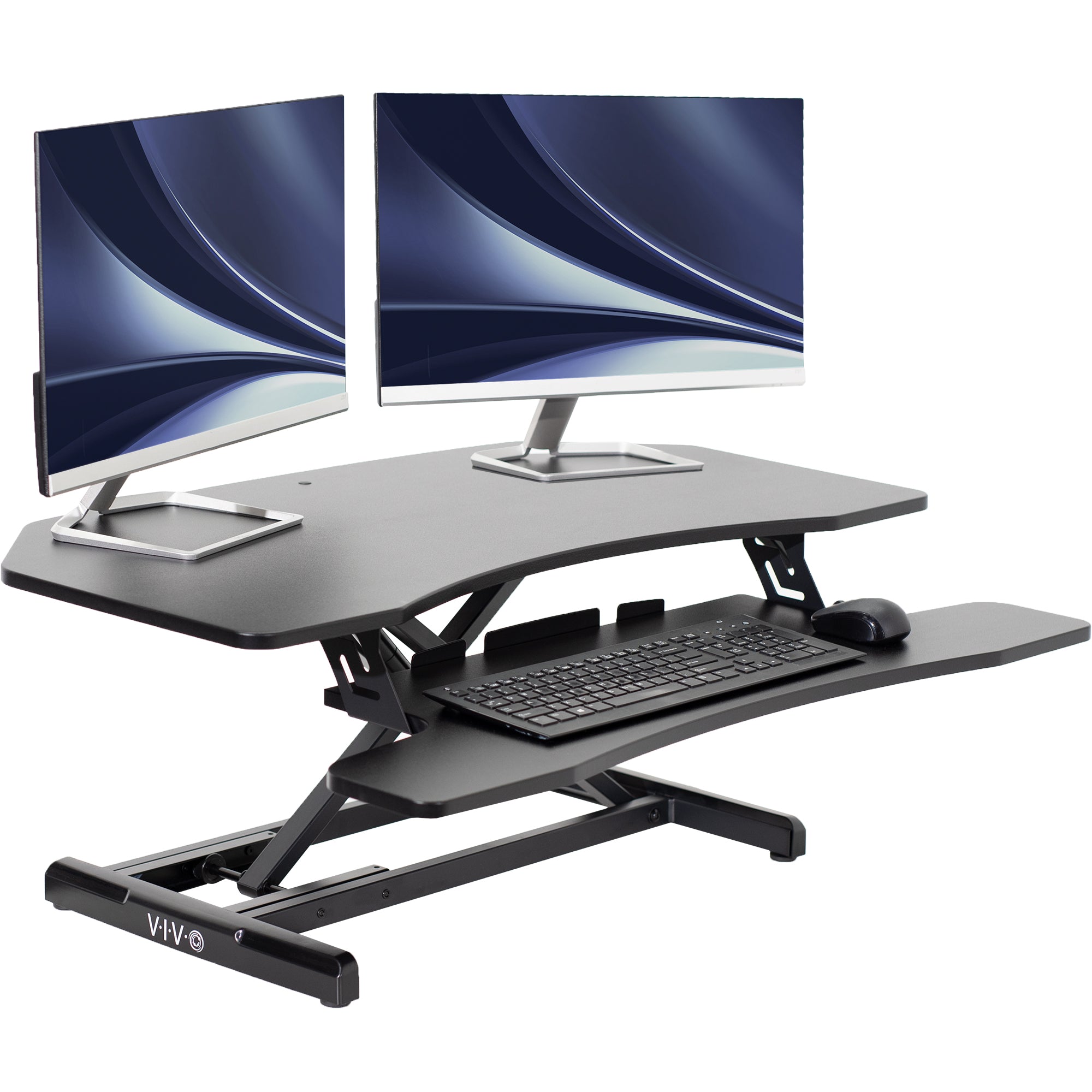 Heavy-duty height adjustable desk converter monitor riser for corner desk workstation.