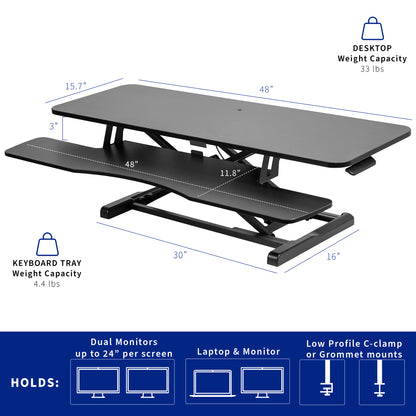 Sturdy height adjustable 2-tiered desk riser for ergonomic office workstation.