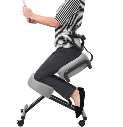 Height adjustable comfortable kneeling chair with locking caster wheels.