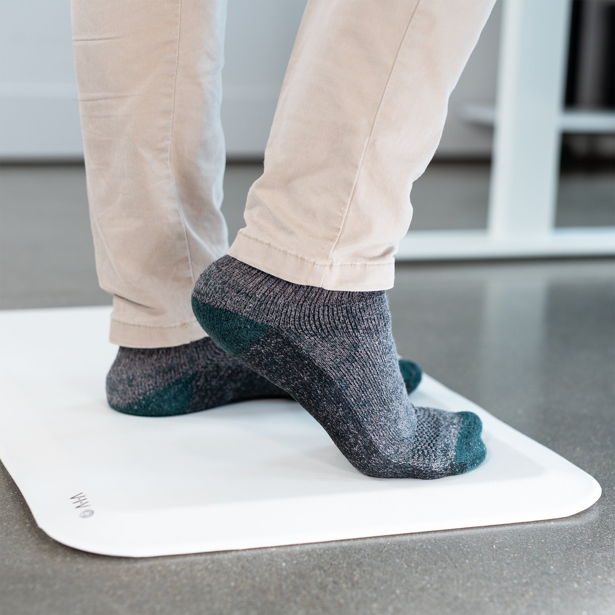 Comfortable multi-use anti-fatigue standing mat made of memory foam.