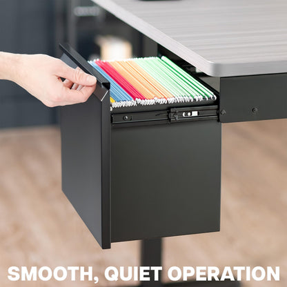 Black file cabinet drawer under desk being opened with colorful files, blurred office background.