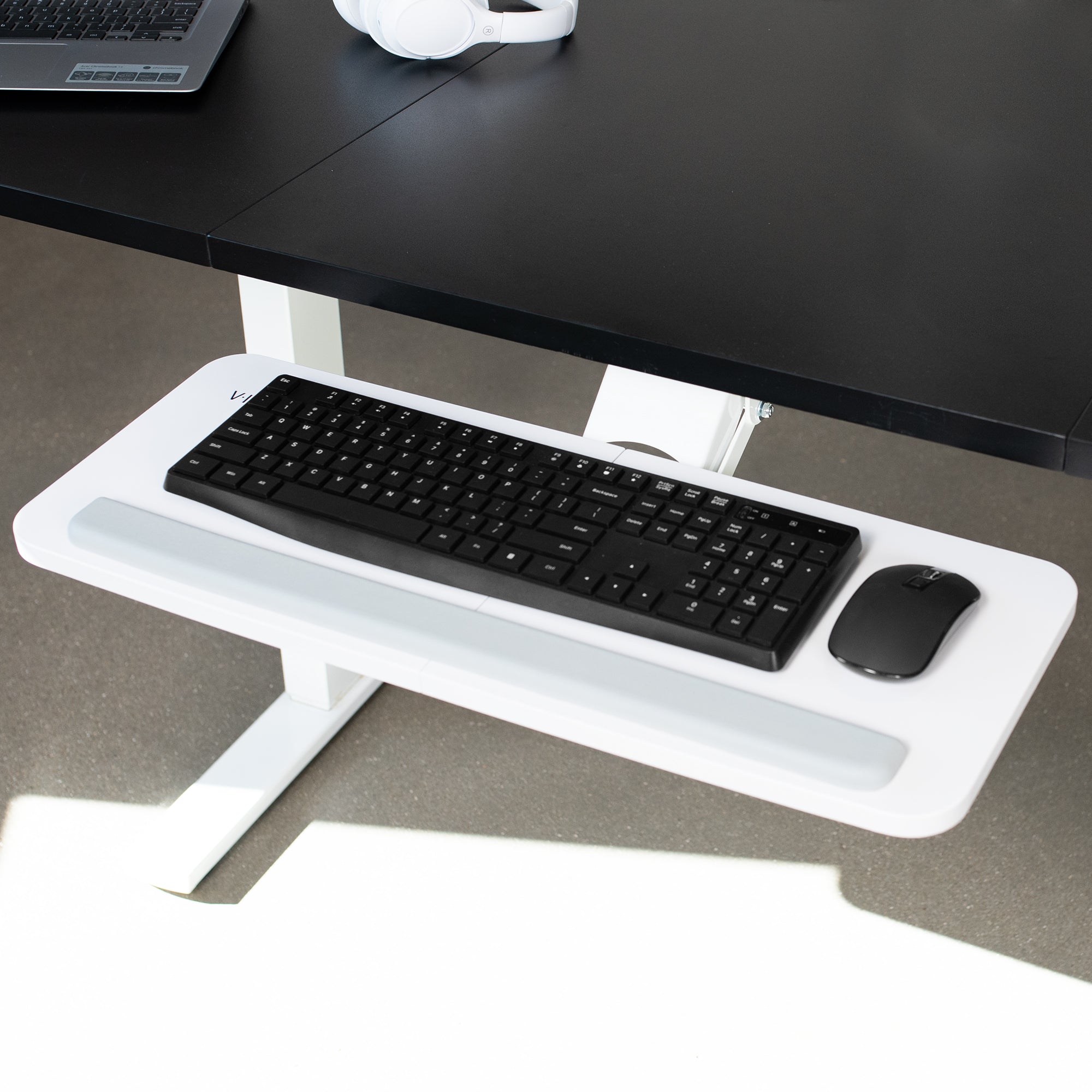 Ergonomic under desk keyboard tray mount with comfortable tilting angles for typing.